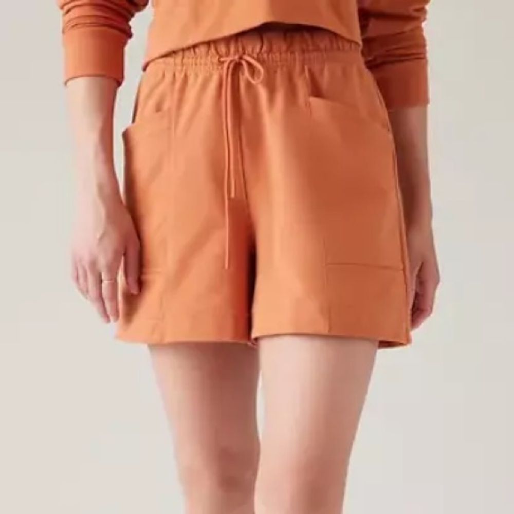 Athleta Retroterry orange breathable shorts size large.